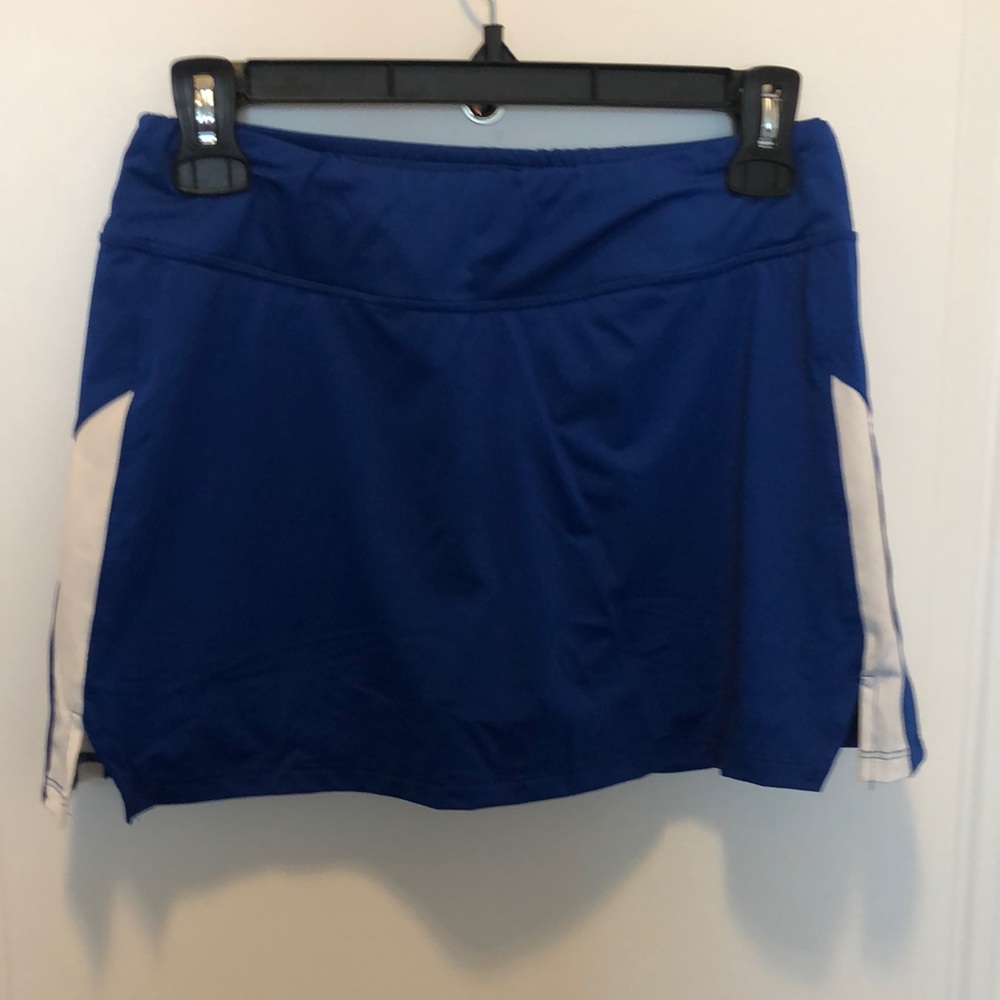 Athletic royal blue skort. Has built in spandex.